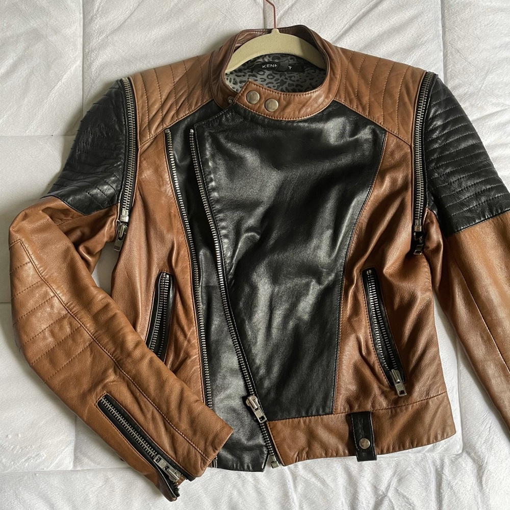 Brown and black leather motorcycle jacket